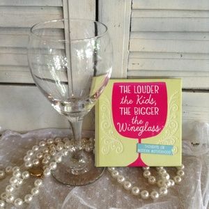 Wineglass and Humorous Book on Motherhood
